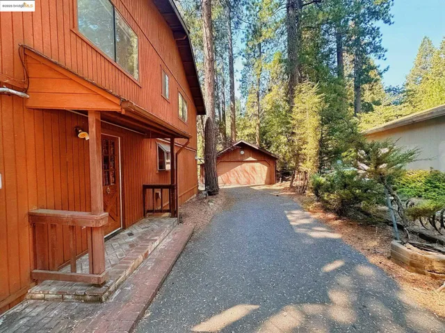 a view of a house with a street