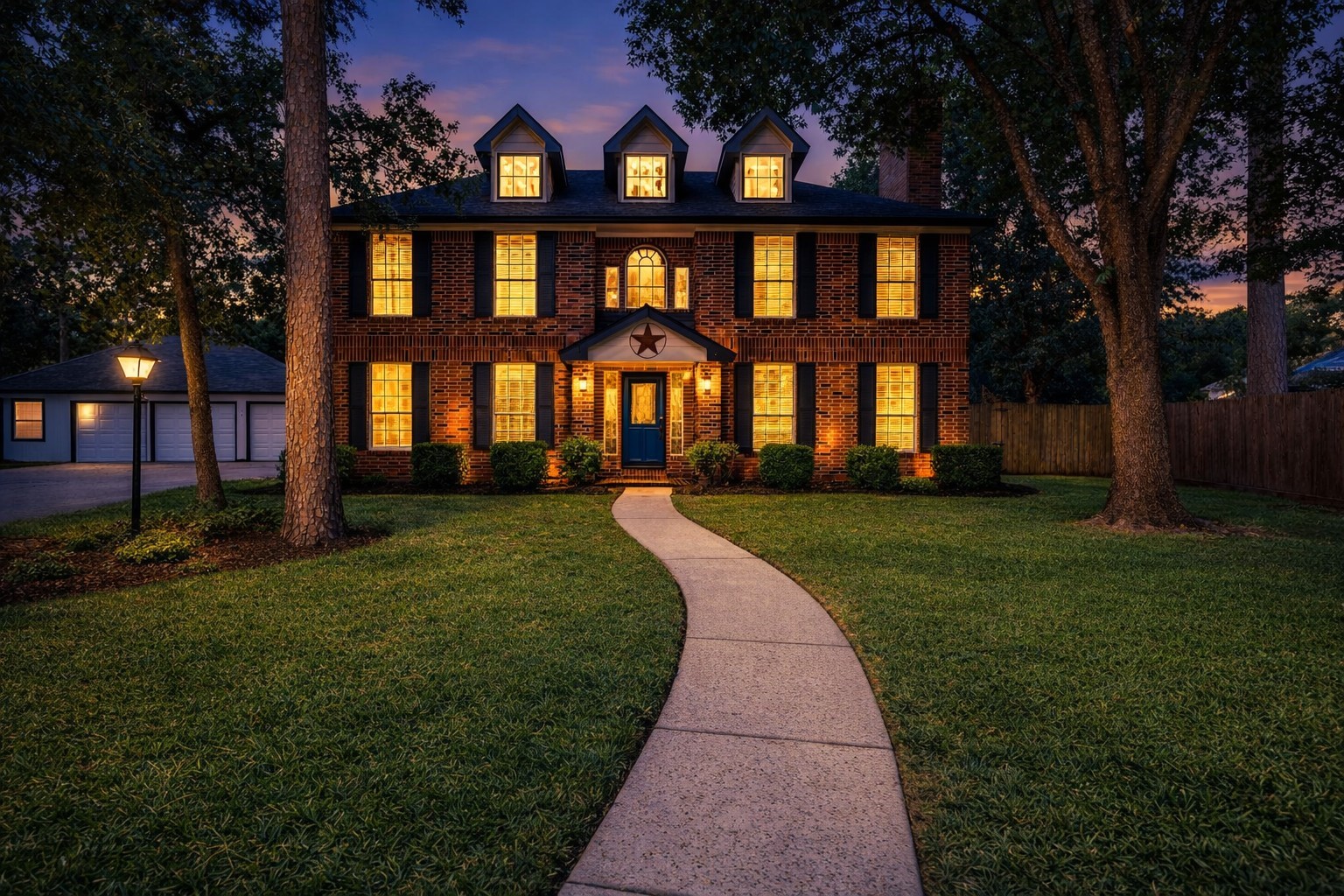 a front view of house with yard and green space