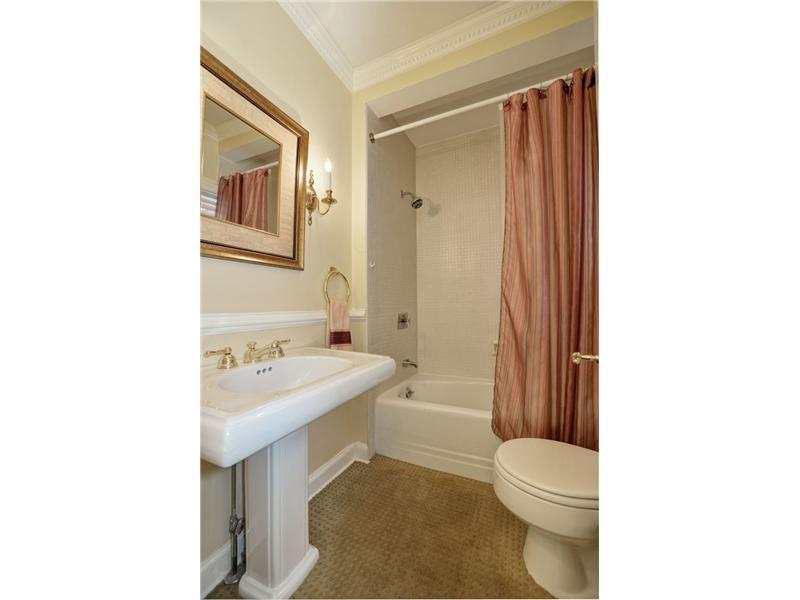 4850 Old Boston Road Whitehall, PA 15227 - Photo 14 of 25 Full Bath. One of the three full bathrooms with this elegant home! This full bathroom is adjacent to the first floor bedroom. Custom neutral tile surround the tub and shower area, a pedestal sink, chair rail molding makes this bathroom sparkle.