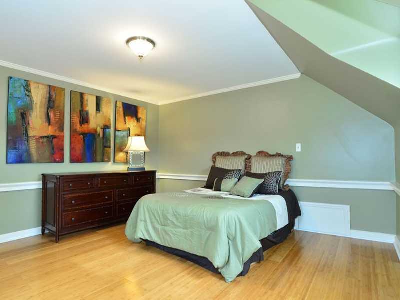 4850 Old Boston Road Whitehall, PA 15227 - Photo 19 of 25 Bedroom. Another one of the three bedrooms on the second floor. This bedroom is 14 x 14 and has custom flooring, crown molding, chair rail molding & a roomy lighted closet.