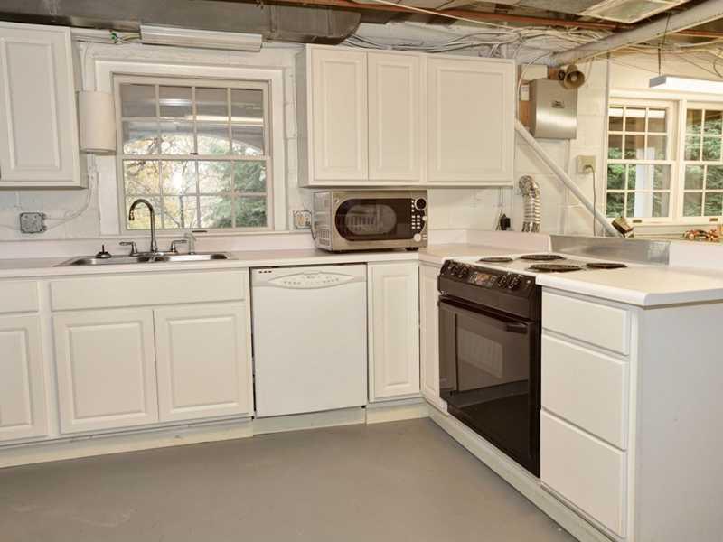 4850 Old Boston Road Whitehall, PA 15227 - Photo 22 of 25 Kitchen. Want to entertain family, friends and guests! There is a second kitchen on the lower level adjacent to the spacious family room and large outdoor patio area! This laundry room area is 23 x 12 ! So much space and storage!