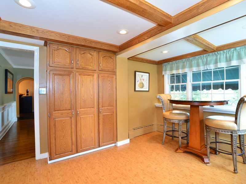 4850 Old Boston Road Whitehall, PA 15227 - Photo 9 of 25 Kitchen. The custom oak pantry...so much space for your kitchen needs! Great eat-in area for family, friends and guests, too! This home has a home warranty, plus a new Bryant Air conditioning unit and custom updates through out.