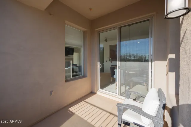a living room with a couch and a table