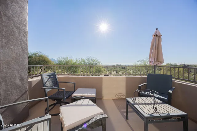 a view of a terrace with couches and a table