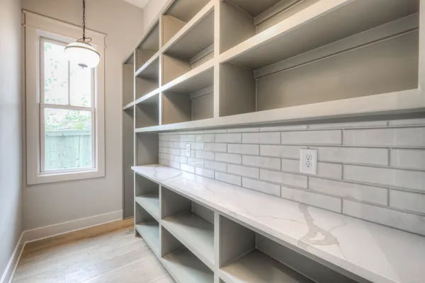 a room with storage and utility