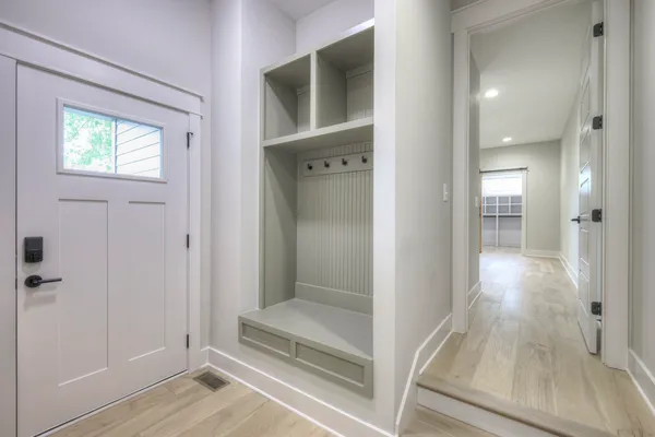 a view of a bathroom from a hallway