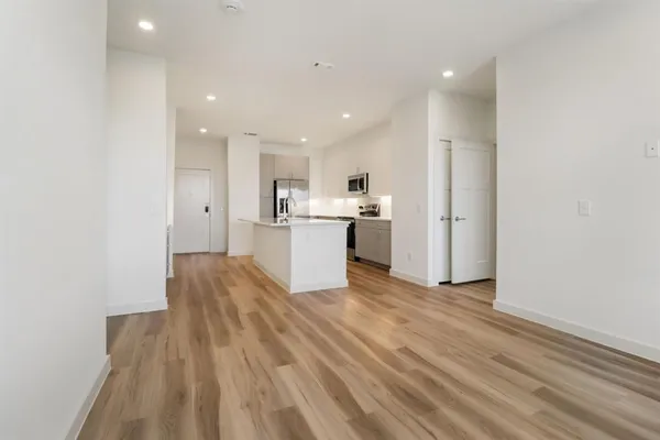 a view of kitchen with wooden floor