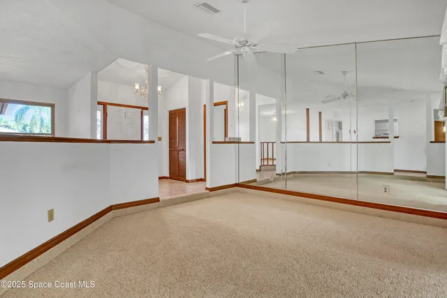 a view of a kitchen with a stove and kitchen view