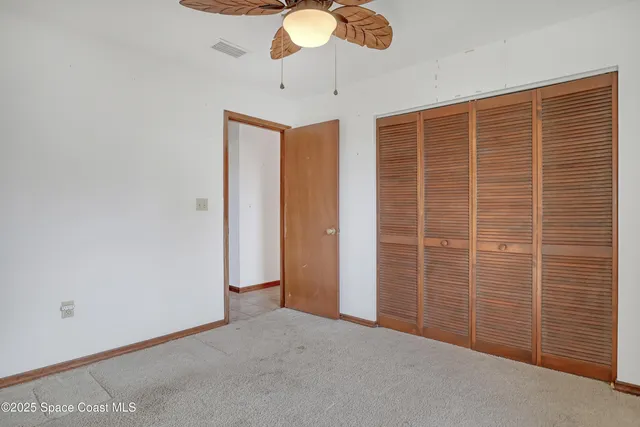 a bathroom with a sink toilet and a mirror
