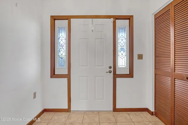 a view of front door with a bathroom
