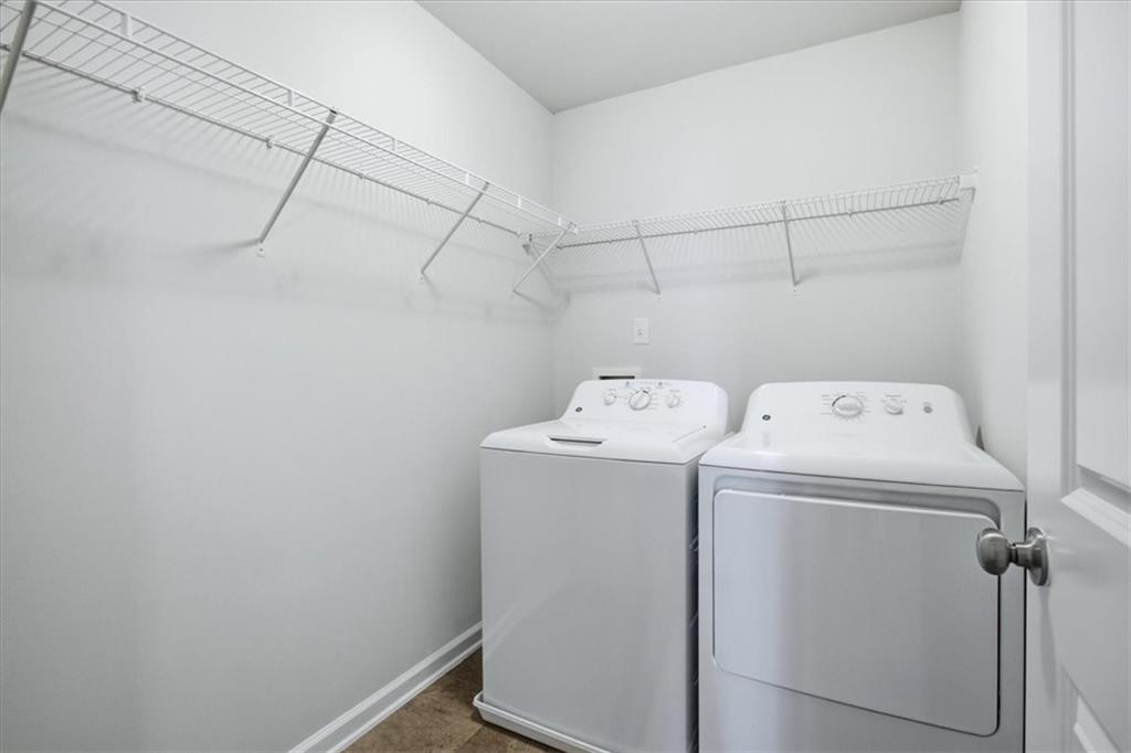 585 Summit Point Canton, GA 30114 - Photo 25 of 30 a utility room with dryer and washer