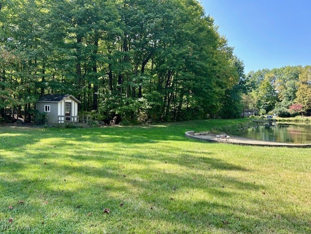 3422 Southern Road Richfield, OH 44286 - Photo 39 of 42 View of yard with a storage shed and a water view