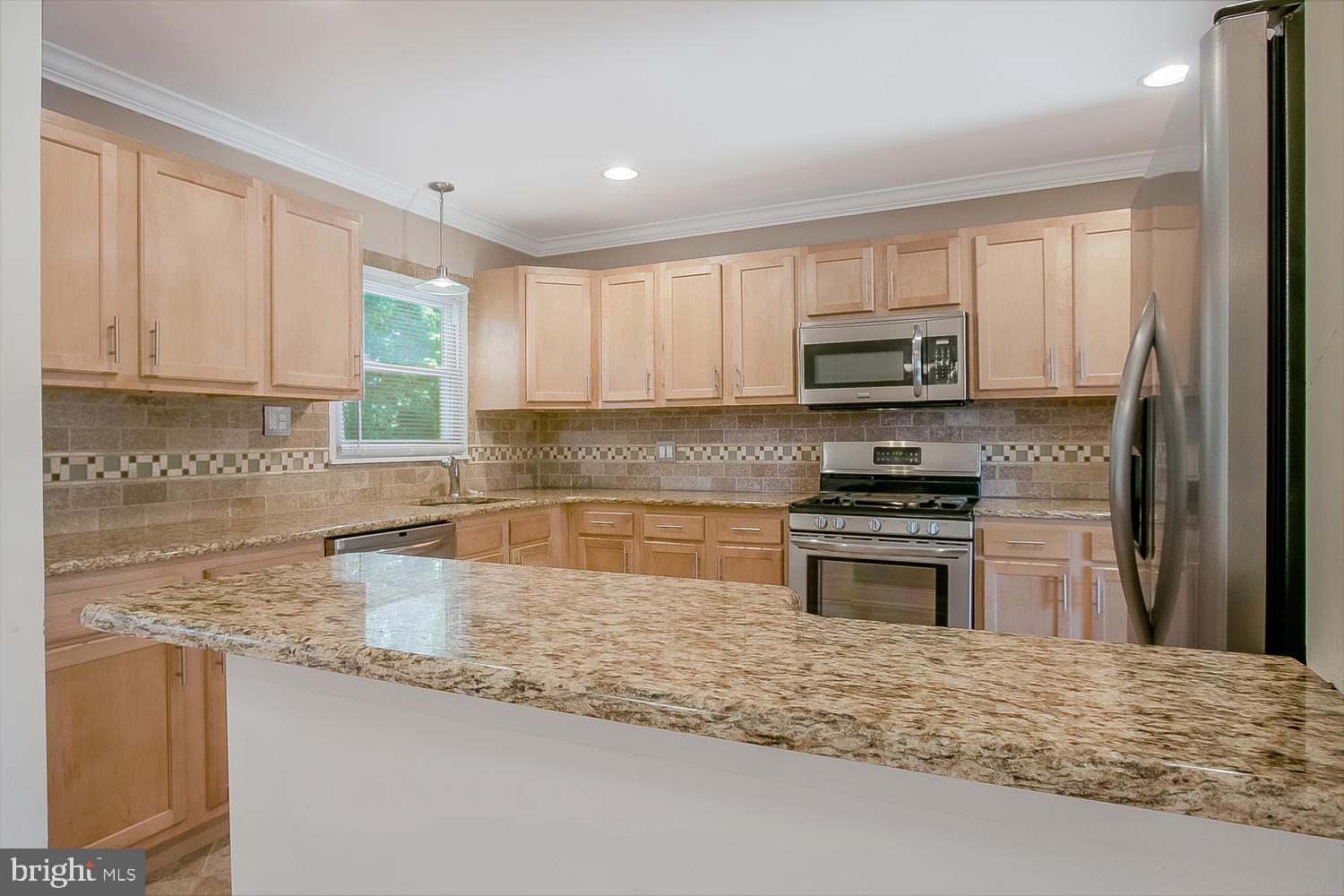 505 Blackstone Road Newark, DE 19713 - Photo 8 of 21 Granite overhang creates a breakfast bar