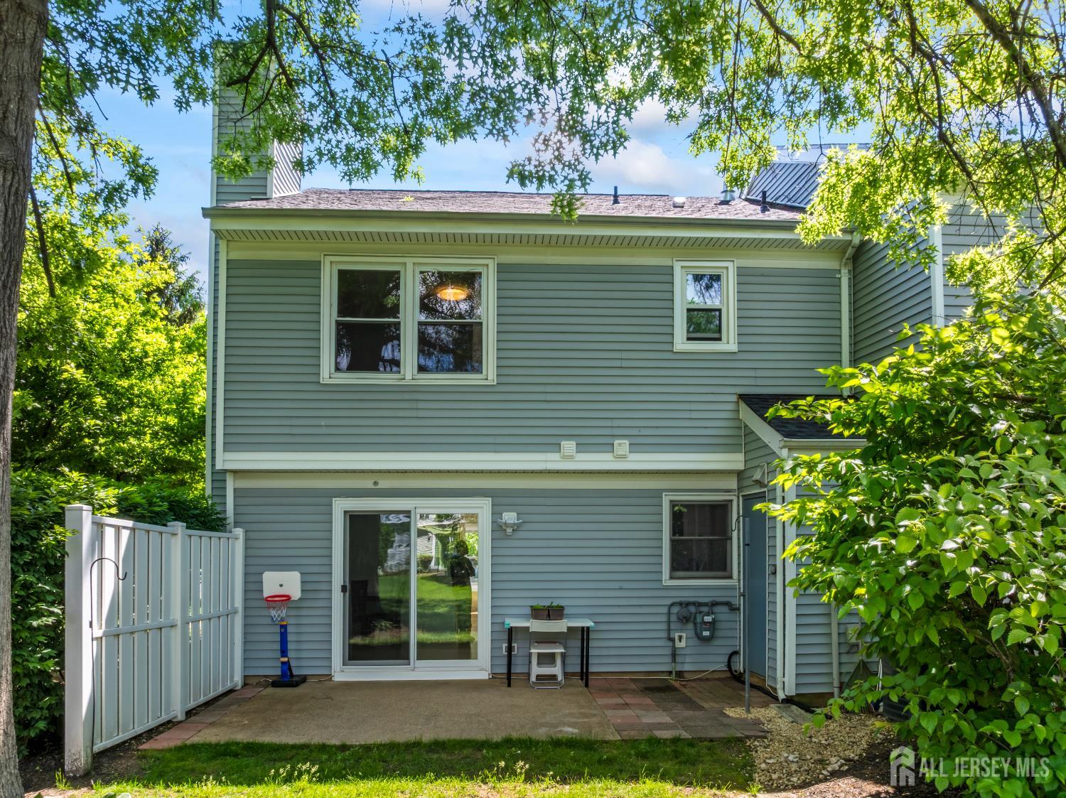 58 La Rue Lane East Brunswick, NJ 08816 - Photo 15 of 26 front view of a house with a yard