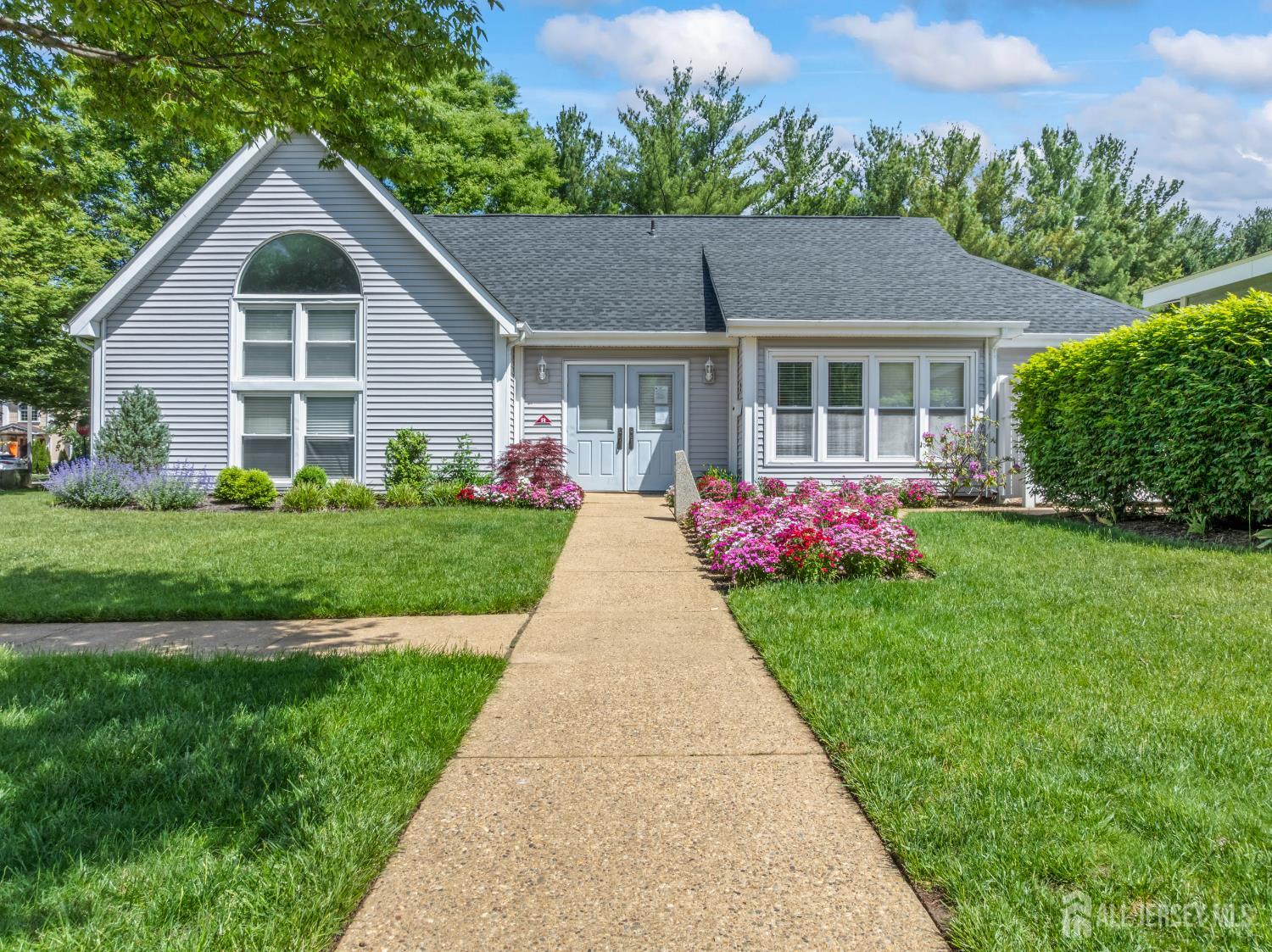 58 La Rue Lane East Brunswick, NJ 08816 - Photo 19 of 26 a front view of a house with garden