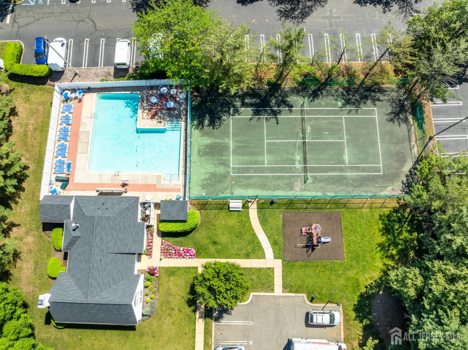 58 La Rue Lane East Brunswick, NJ 08816 - Photo 23 of 26 an aerial view of a house with a yard basket ball court and outdoor seating