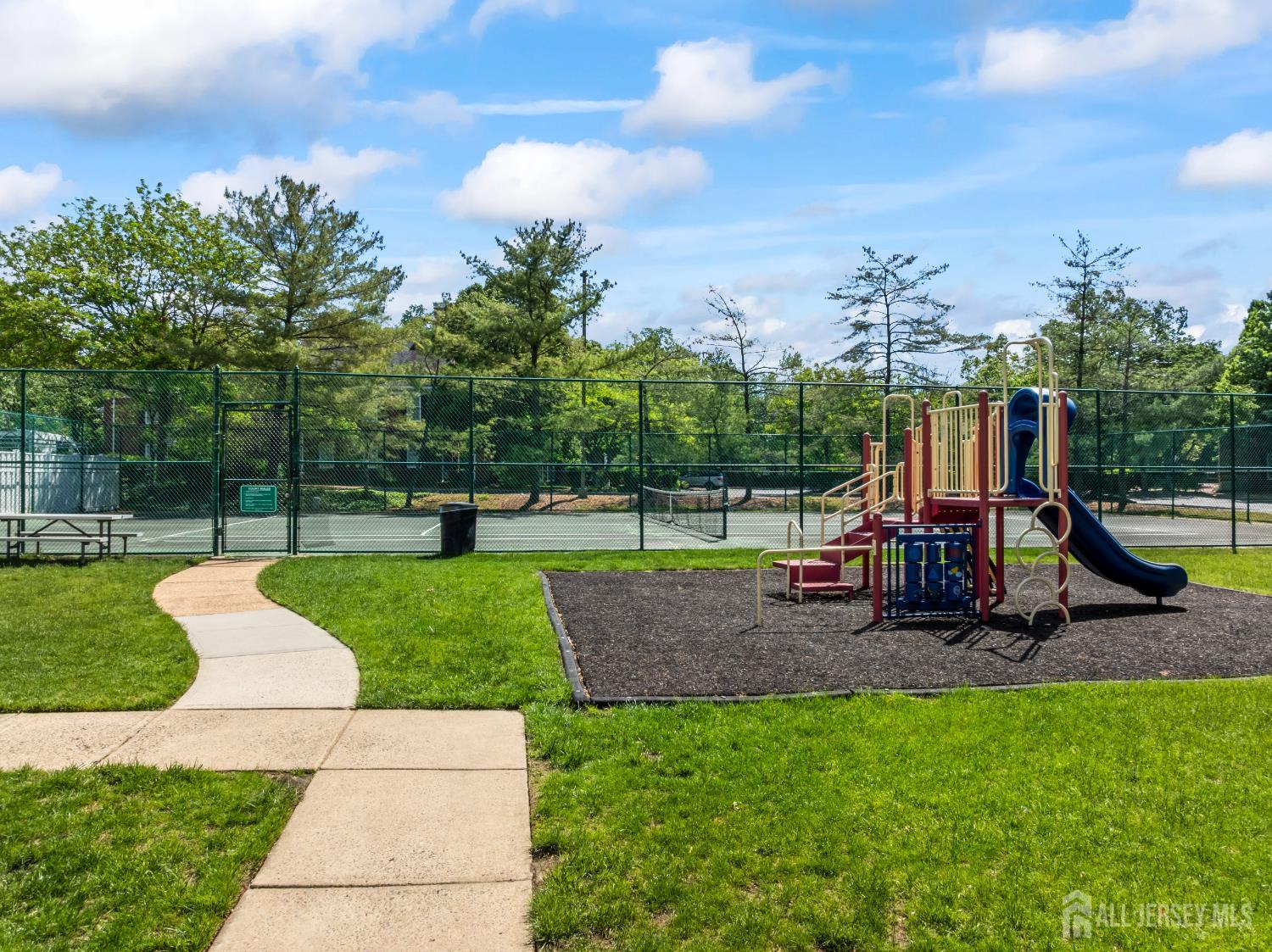 58 La Rue Lane East Brunswick, NJ 08816 - Photo 24 of 26 a view of a park with swings