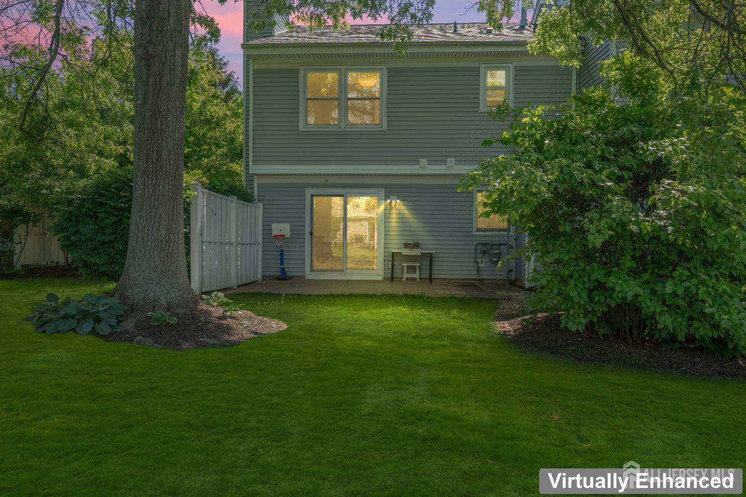 58 La Rue Lane East Brunswick, NJ 08816 - Photo 25 of 26 a front view of a house with a yard
