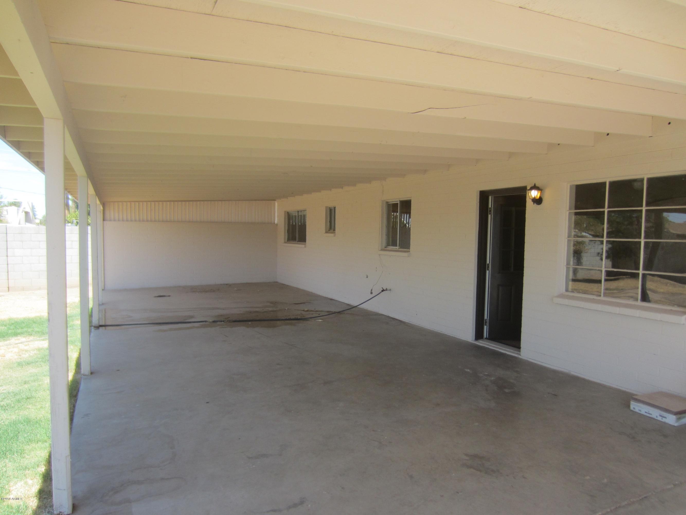 3937 West Griswold Road Phoenix, AZ 85051 - Photo 8 of 10 HUGE COVERED PATIO