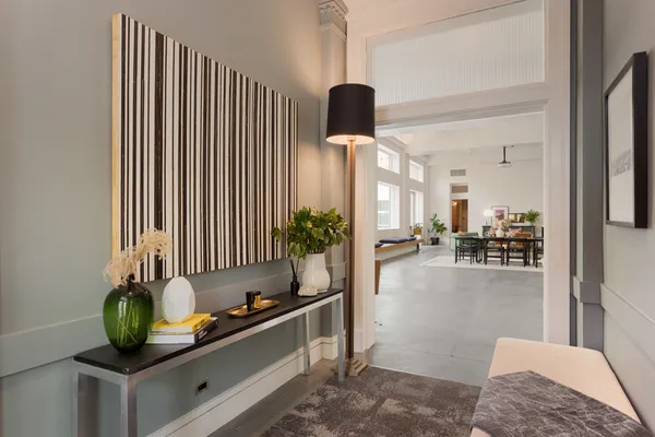 a kitchen with sink and cabinets