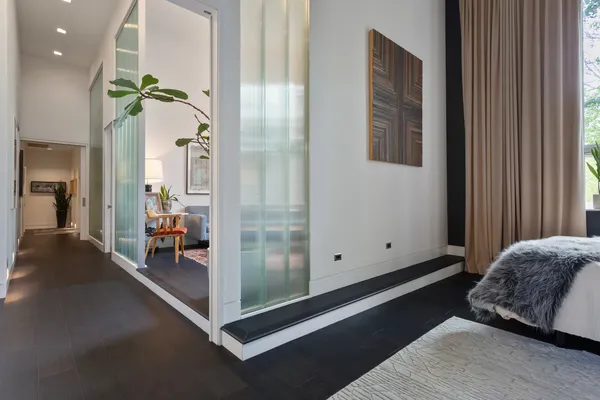 a living room with furniture and a rug