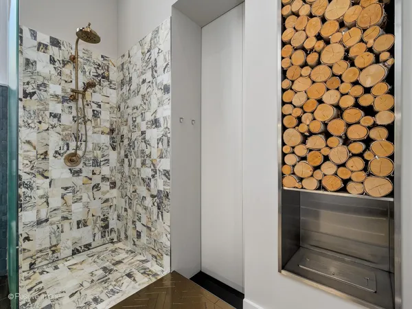 a view of a workspace with furniture and a potted plant