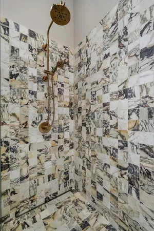 a bathroom with a sink and mirror