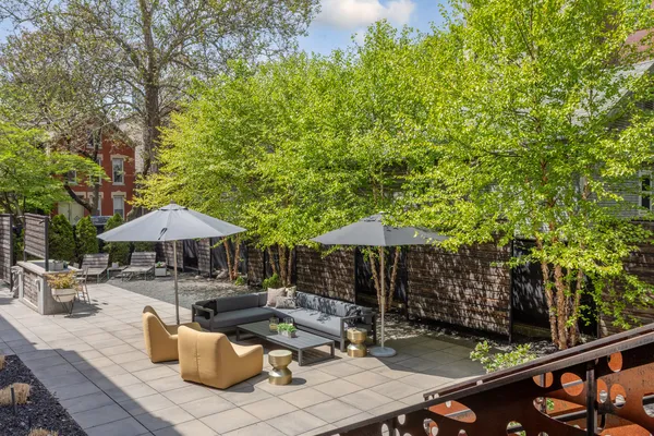 a view of a patio with couches and a table