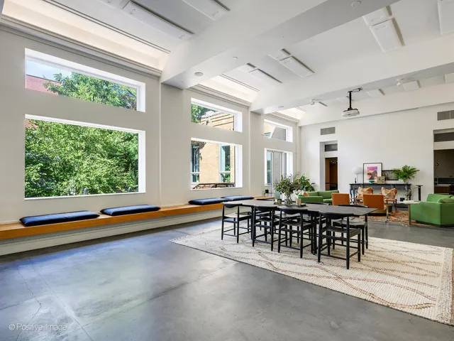 a view of room with furniture and wooden floor