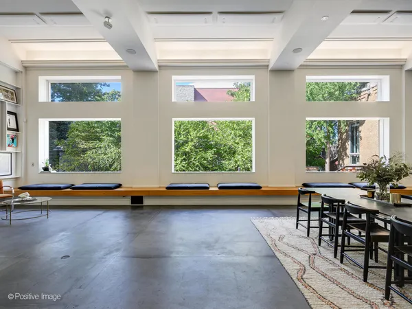 a bathroom with a bathtub and window