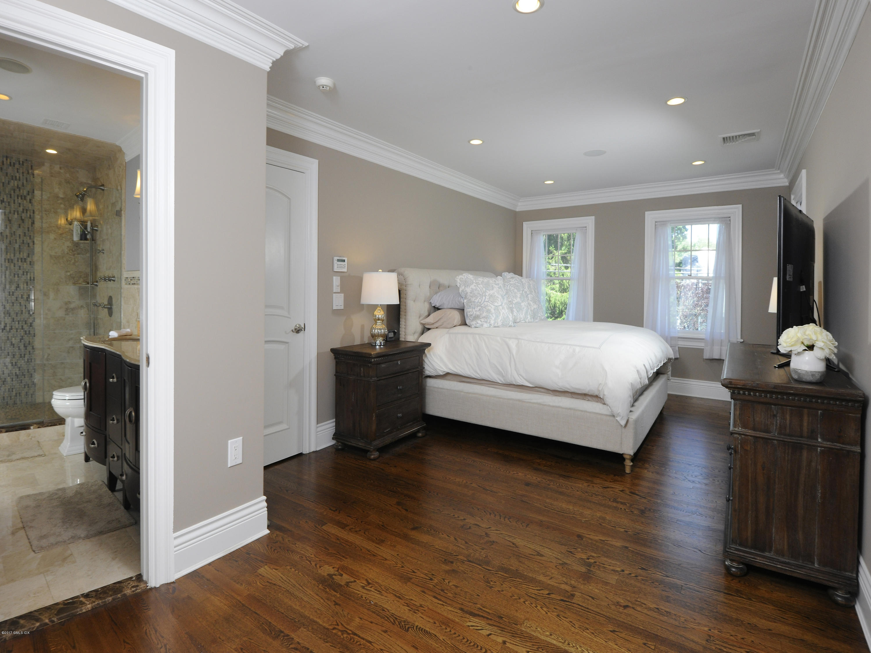 4 Sunshine Avenue Riverside, CT 06878 - Photo 13 of 21 a bedroom with a bed and wooden floor