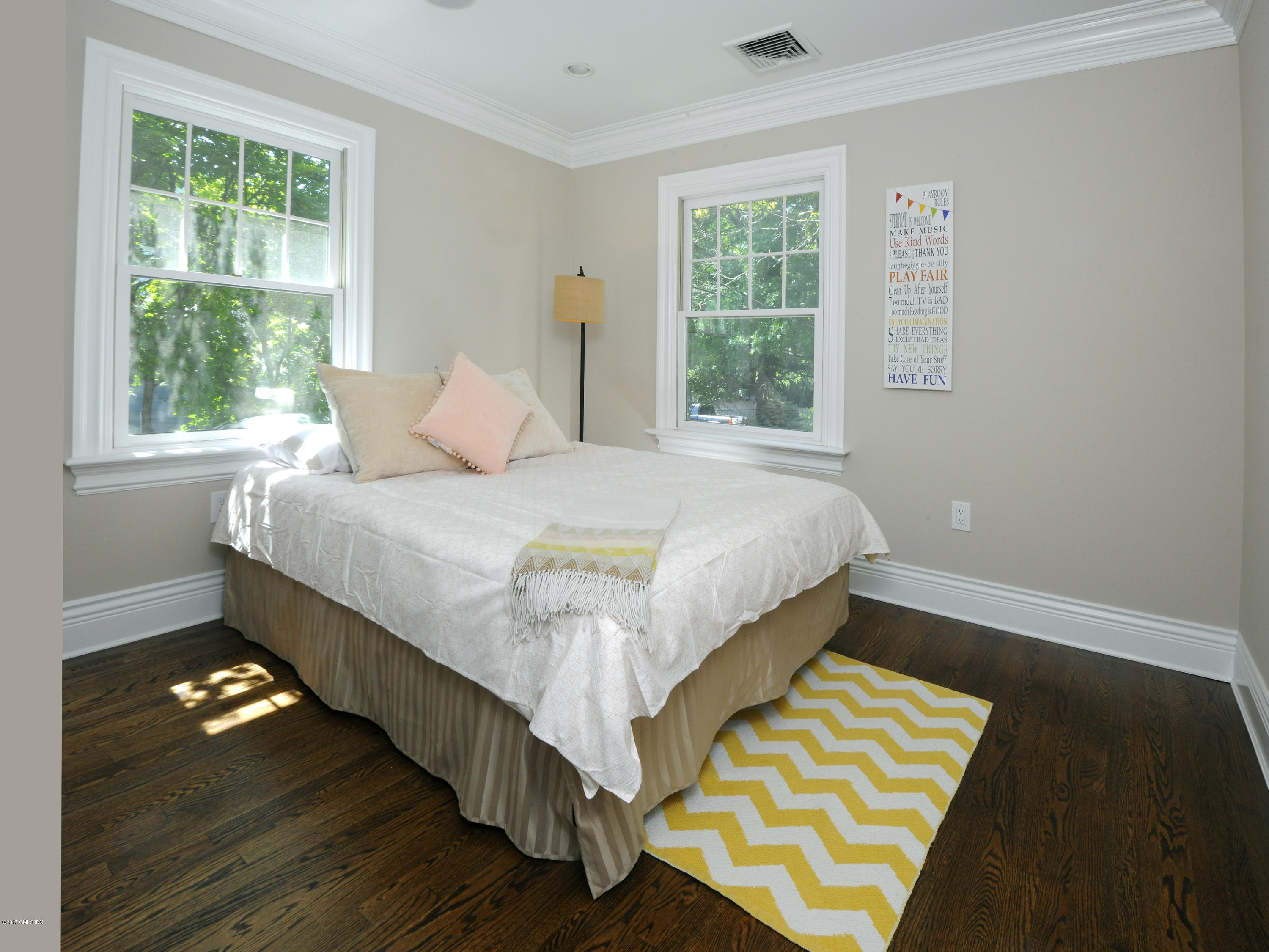4 Sunshine Avenue Riverside, CT 06878 - Photo 18 of 21 a bedroom with a bed and window