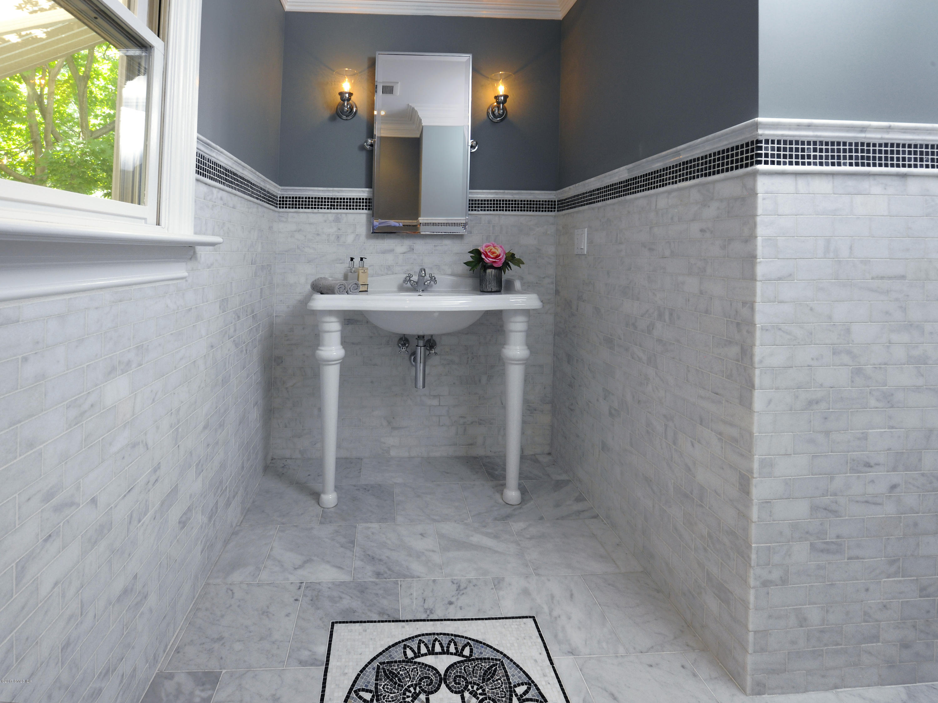 4 Sunshine Avenue Riverside, CT 06878 - Photo 19 of 21 a bathroom with a sink and a mirror