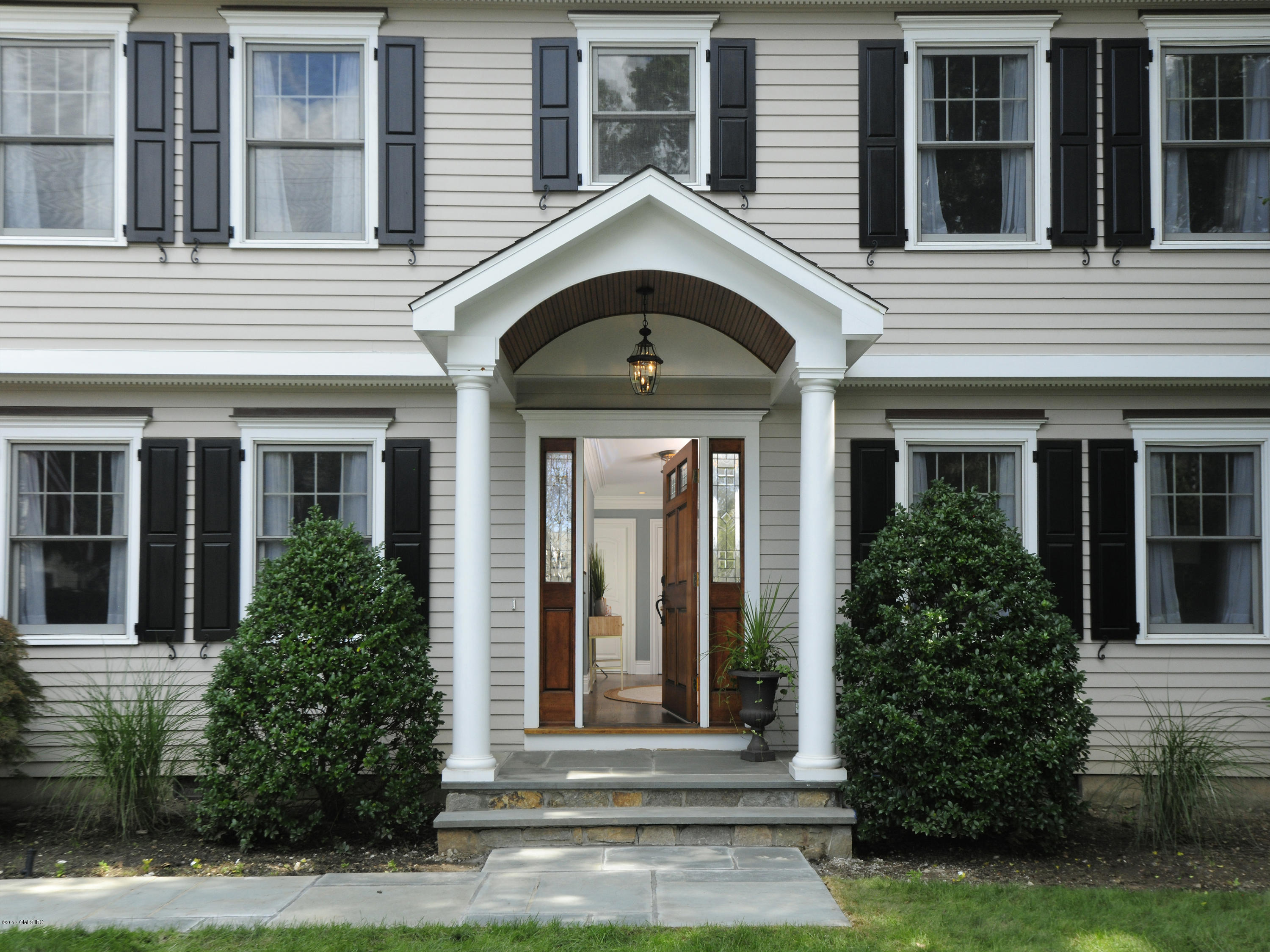 4 Sunshine Avenue Riverside, CT 06878 - Photo 3 of 21 a front view of a house with garden