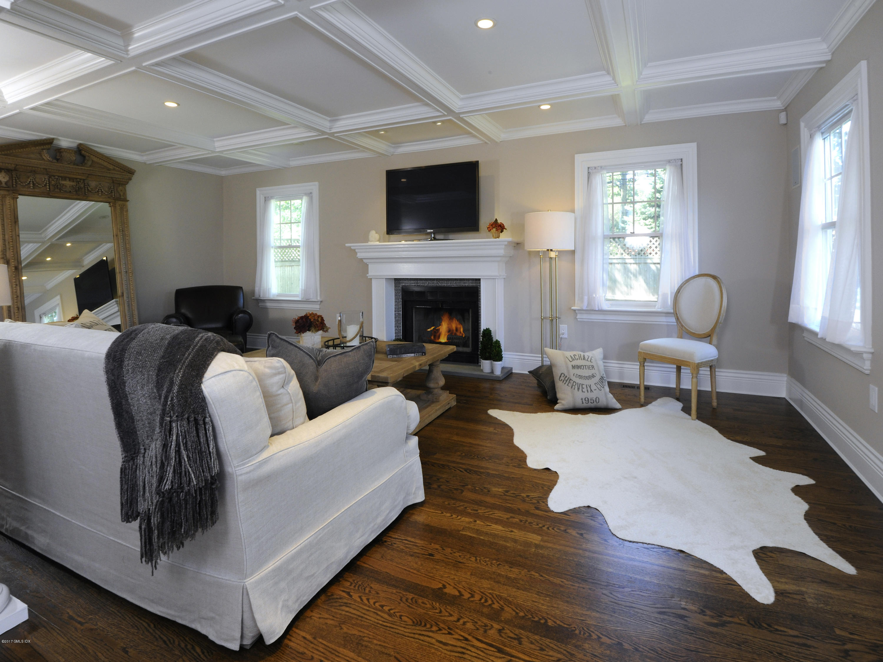 4 Sunshine Avenue Riverside, CT 06878 - Photo 6 of 21 a living room with furniture fireplace and a window