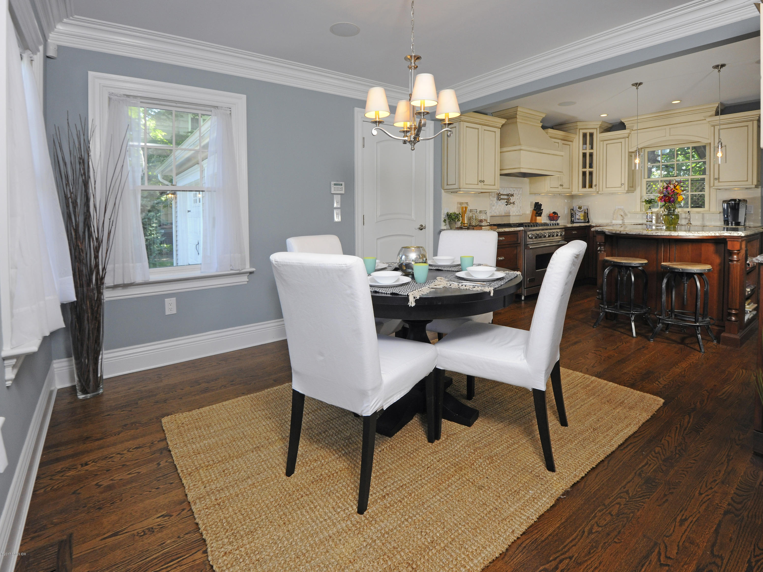 4 Sunshine Avenue Riverside, CT 06878 - Photo 10 of 21 a view of a dining room with furniture window and wooden floor