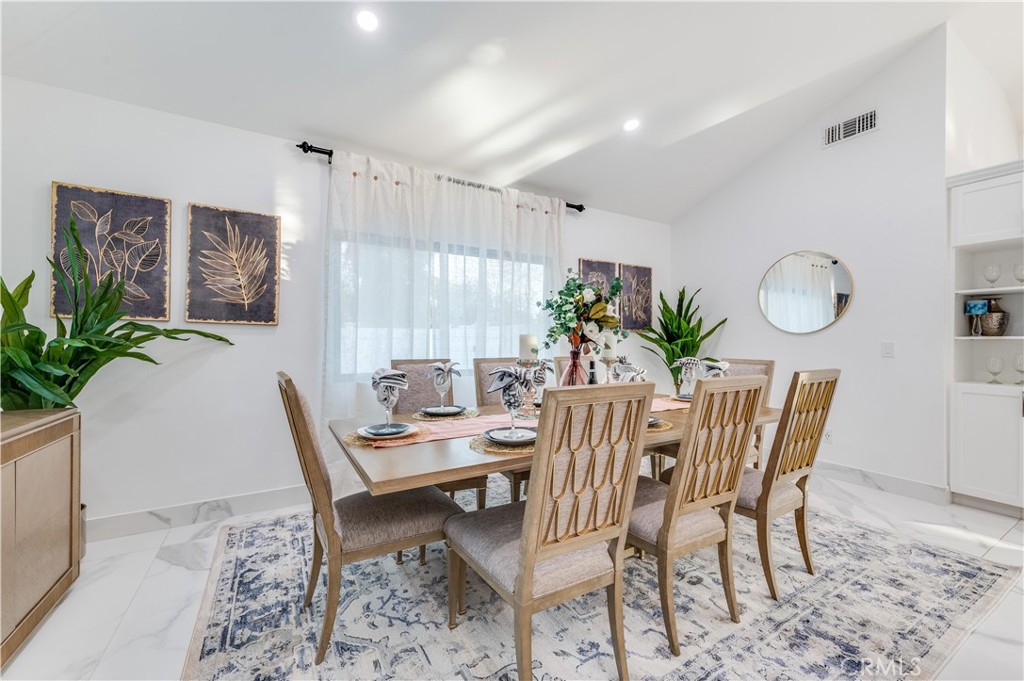 3890 Shadow Grove Road Pasadena, CA 91107 - Photo 13 of 63 a dining room with furniture and window