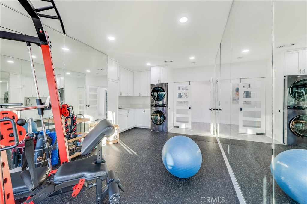 3890 Shadow Grove Road Pasadena, CA 91107 - Photo 28 of 63 a room with lots of wooden furniture and a equipment