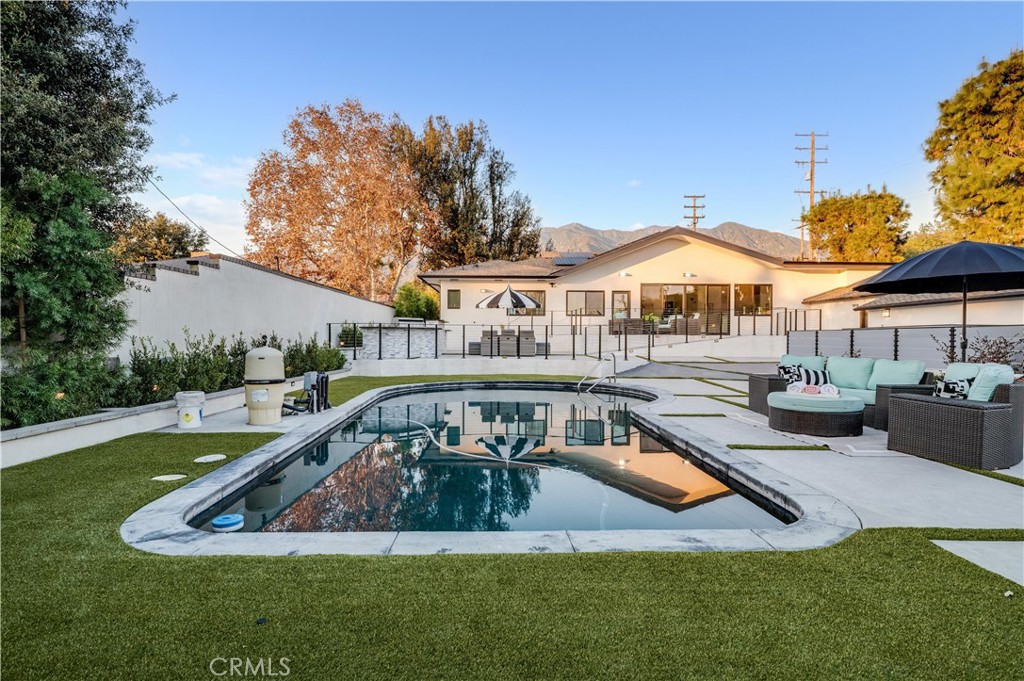 3890 Shadow Grove Road Pasadena, CA 91107 - Photo 44 of 63 a view of a house with swimming pool and porch