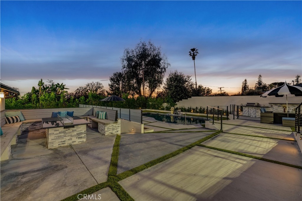 3890 Shadow Grove Road Pasadena, CA 91107 - Photo 51 of 63 a view of a patio with swimming pool