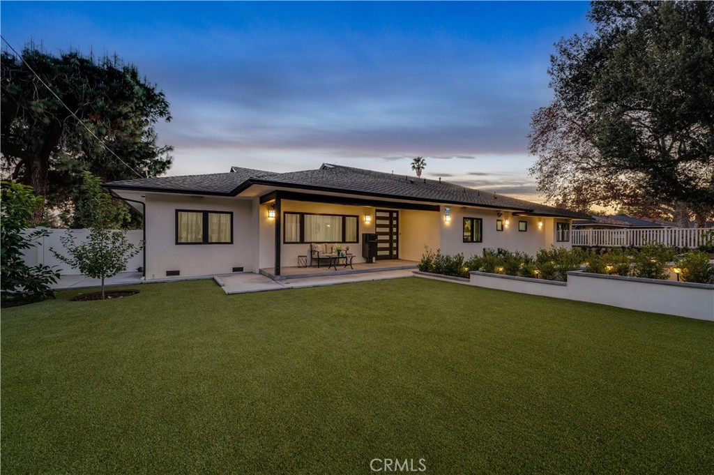 3890 Shadow Grove Road Pasadena, CA 91107 - Photo 54 of 63 a front view of house with yard and green space