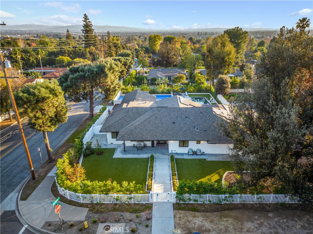 3890 Shadow Grove Road Pasadena, CA 91107 - Photo 56 of 63 an aerial view of a house with a yard and lake view