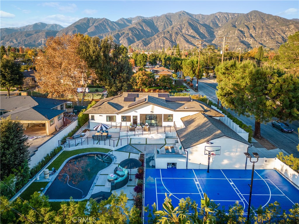 3890 Shadow Grove Road Pasadena, CA 91107 - Photo 62 of 63 a view of a house with a yard and sitting area