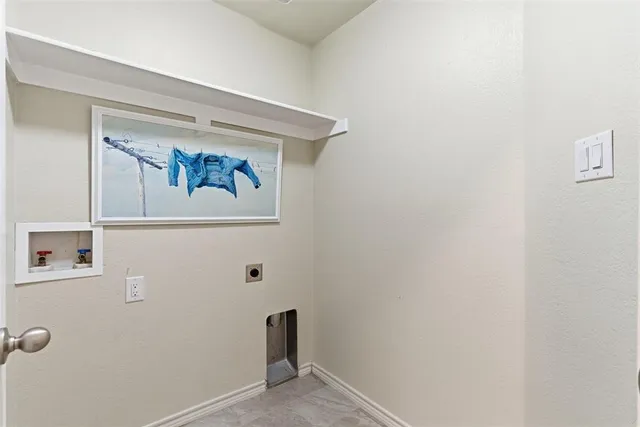 a bathroom with a bathtub shower sink and a mirror