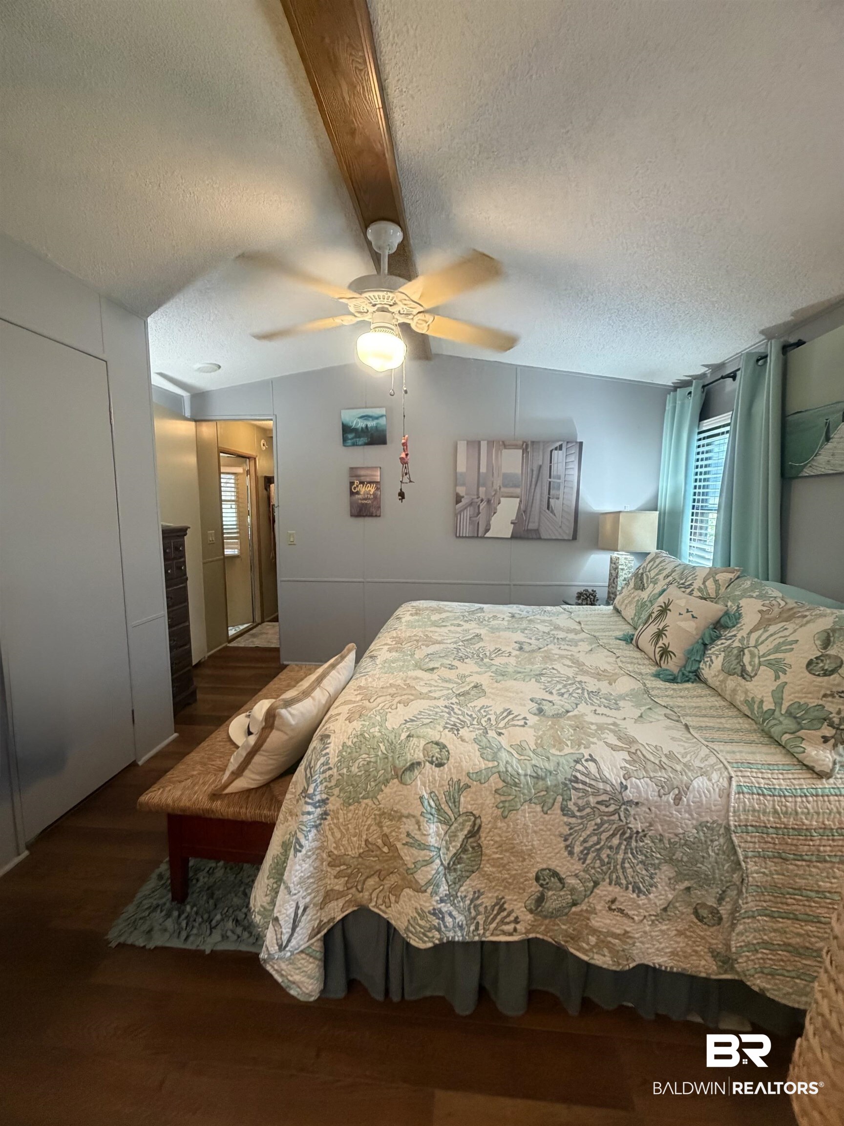 1620 Del Rey Drive Lillian, AL 36549 - Photo 15 of 45 Vaulted ceiling featuring a wood-finish beam and a ceiling fan with integrated lighting