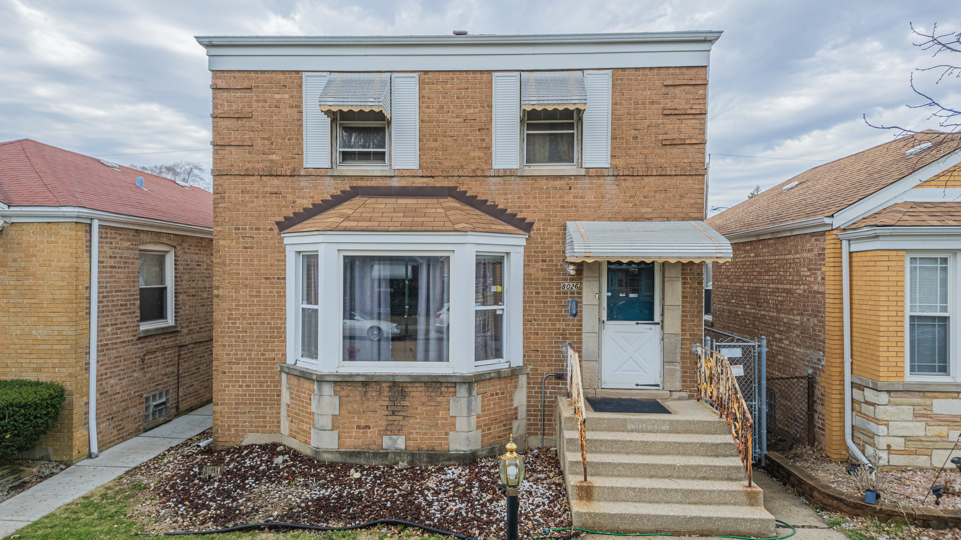 8026 South Fairfield Avenue Chicago, IL 60652 - Photo 1 of 18 a front view of a house with a window