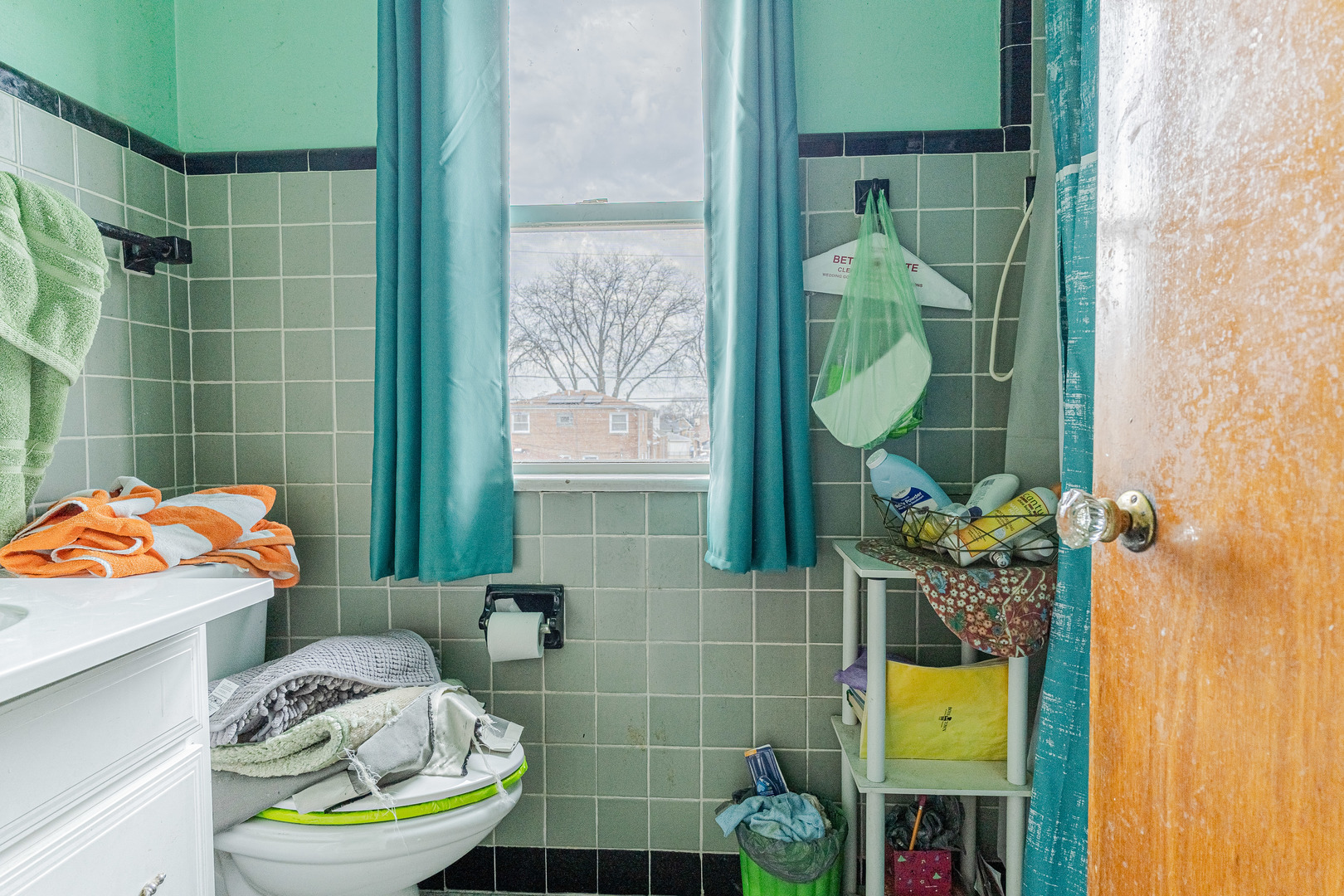 8026 South Fairfield Avenue Chicago, IL 60652 - Photo 14 of 18 a bathroom with a sink and toilet