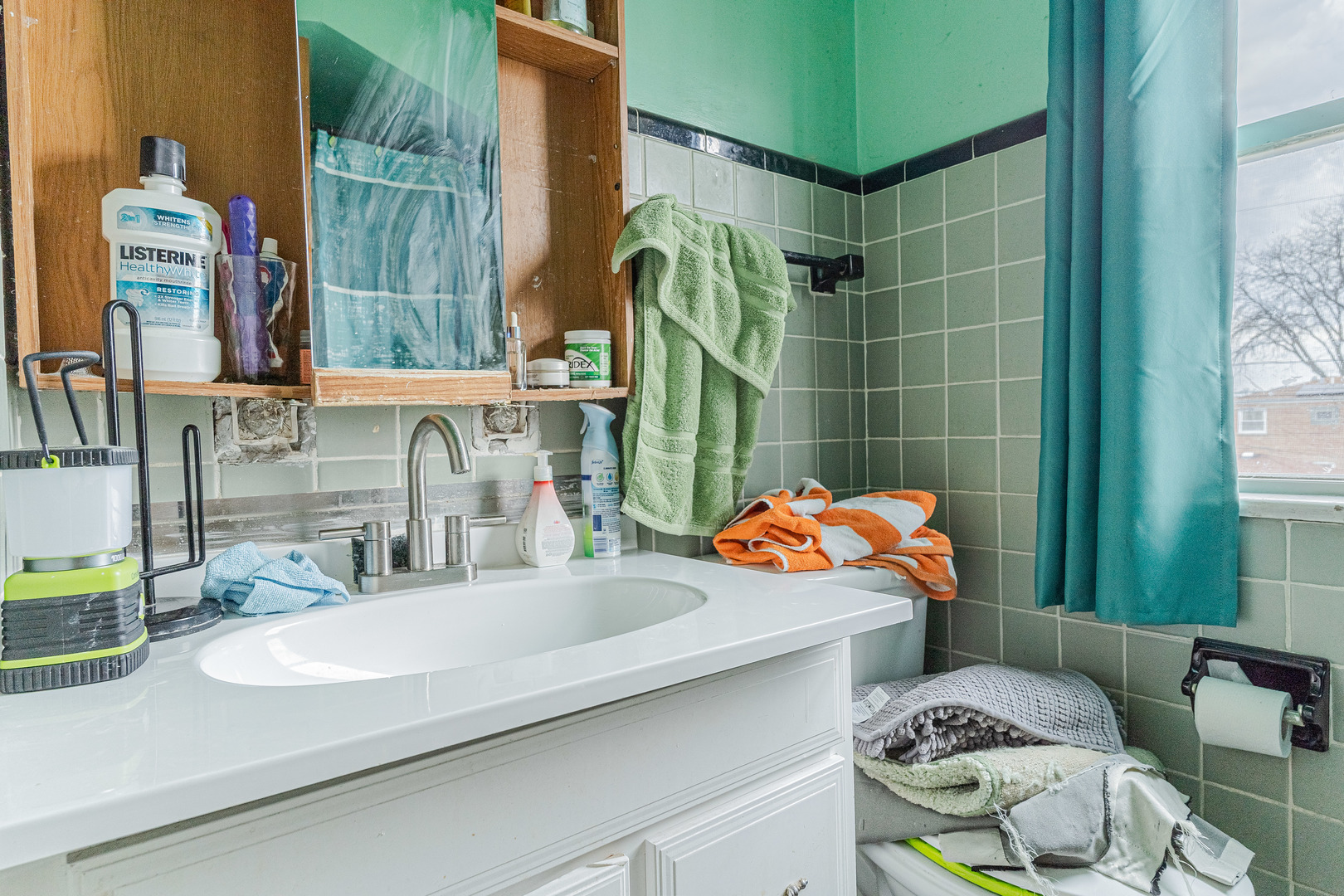 8026 South Fairfield Avenue Chicago, IL 60652 - Photo 15 of 18 a bathroom with a sink mirror and toilet