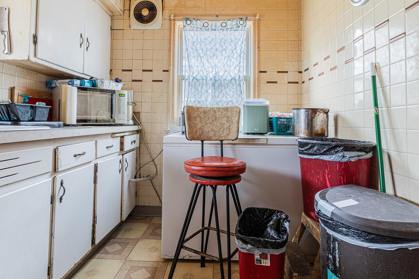 8026 South Fairfield Avenue Chicago, IL 60652 - Photo 5 of 18 a kitchen with stainless steel appliances a stove a sink and a refrigerator