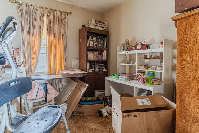 a room with furniture and a window